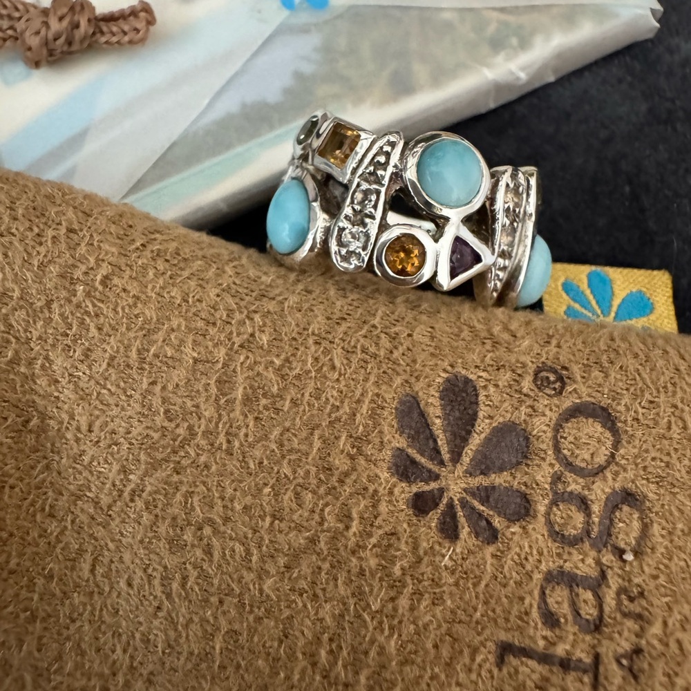 Marahlago Sterling Silver and muti stone band style ring.